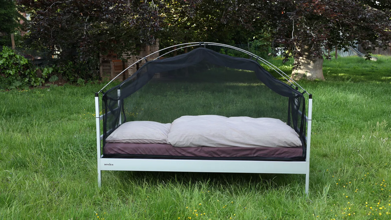 A portable outdoor bed shows the space and structure of an elevated system
