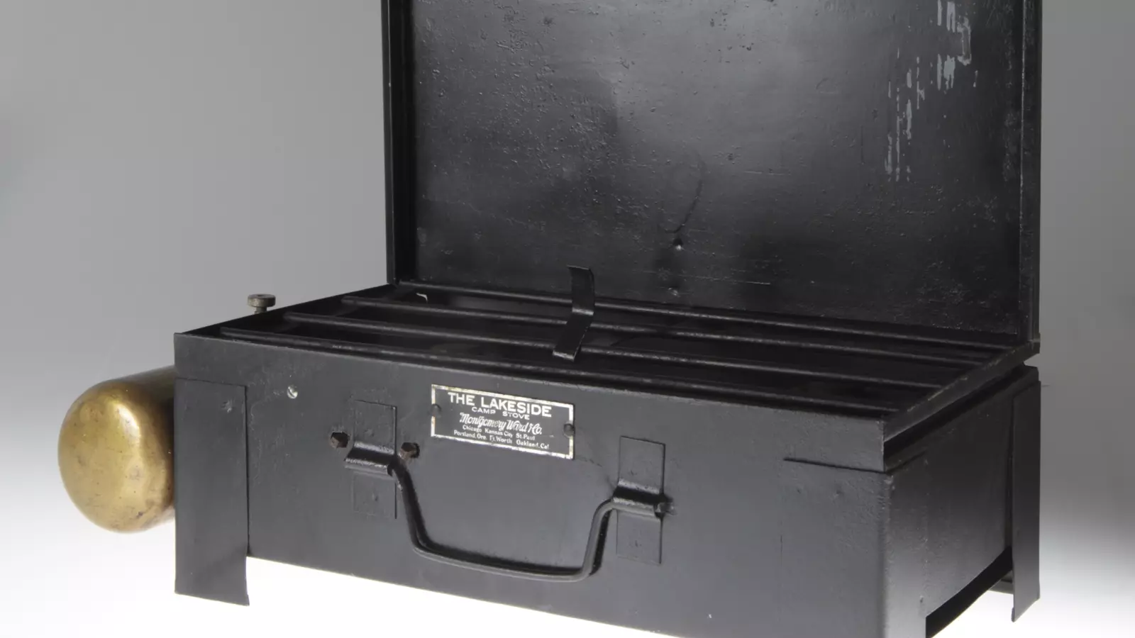 Historic portable gas stove illustrating an outdoor-only appliance category