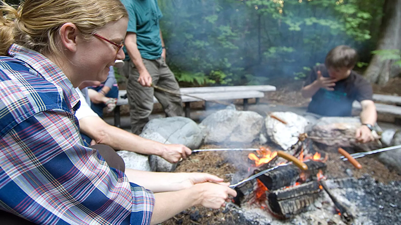 Camping meal near an outdoor fire