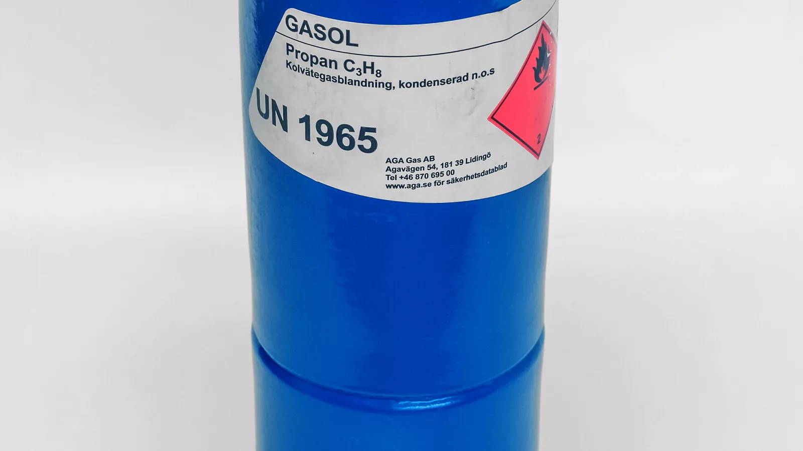 Small propane cylinder representing measurable fuel mass