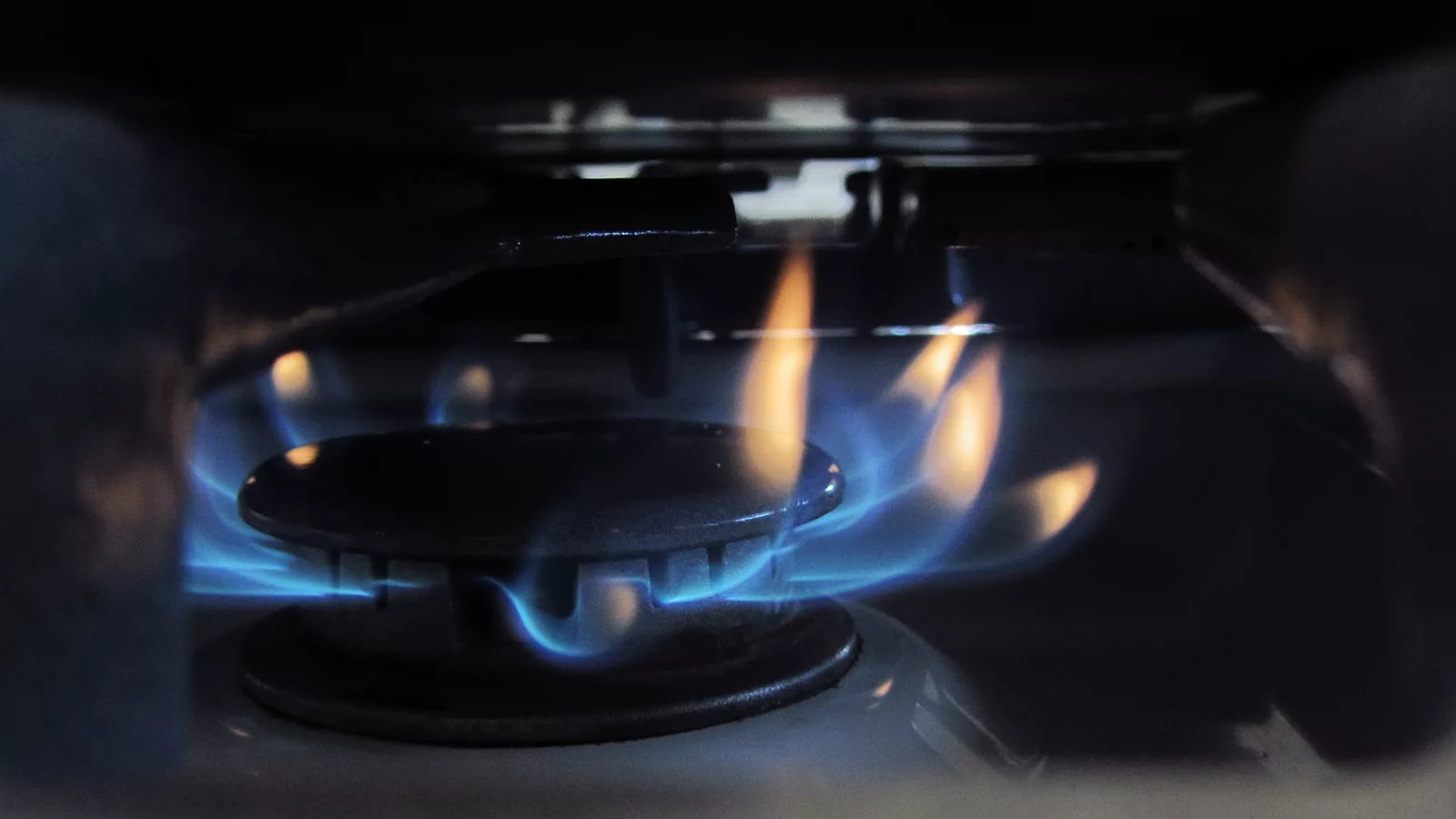Clean gas burner flame during an outdoor post-service test