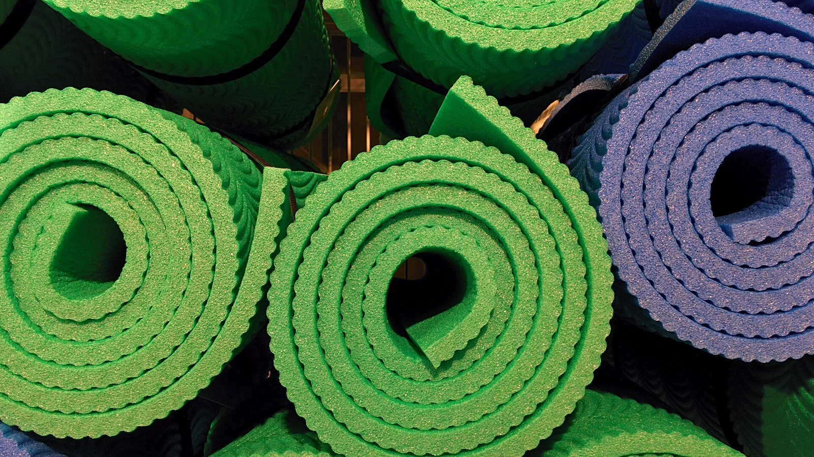 Rolled closed-cell foam sleeping pads