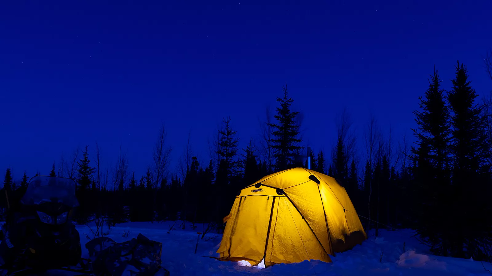 An arctic tent on snow demonstrates conditions where a high-margin system is essential