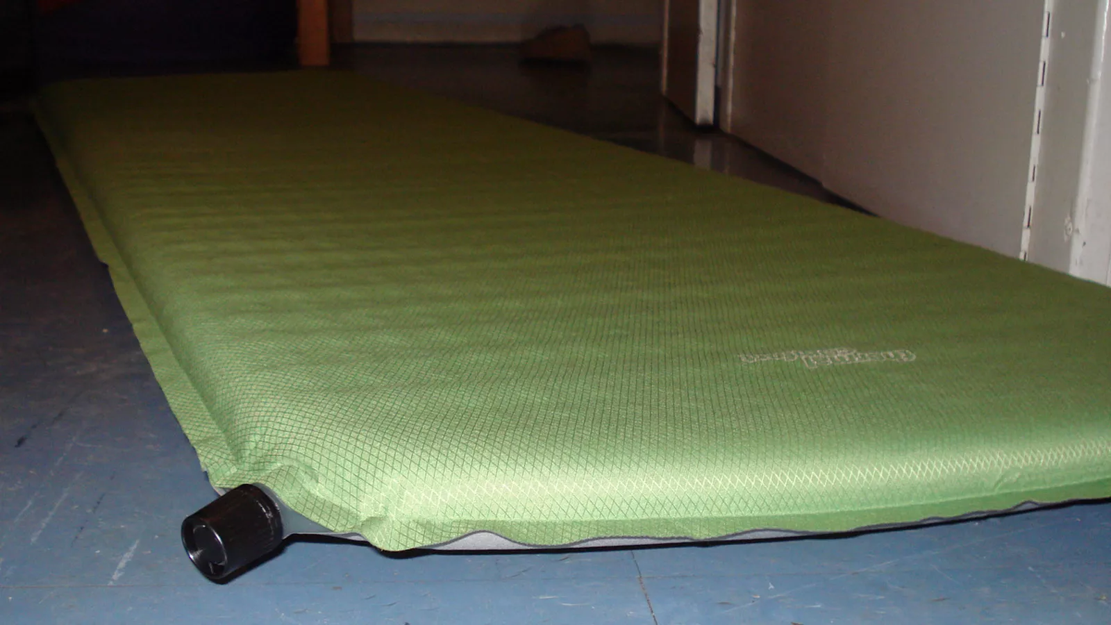 A self-inflating pad uses foam and air rather than height alone